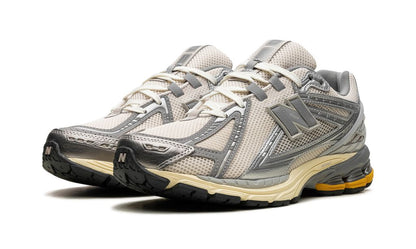 New Balance 1906R "Metallic Silver Yellow"